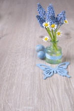 Wooden Background With Spring Flowers And Quail Egg