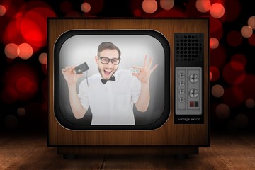 Poster - Geeky hipster holding a retro tape cassette player