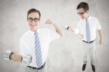 Poster - Composite image of nerd lifting dumbbell