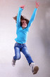 portrait of child  jumping and dancing