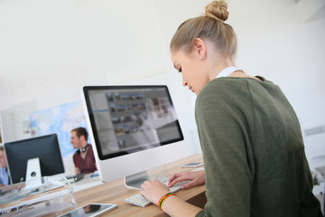 Aufkleber - Student girl working on desktop computer