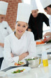 © goodluz - Portrait of student girl in cooking training course