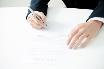 Business man signing a contract