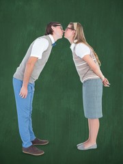 Poster - Composite image of geeky hipster couple kissing