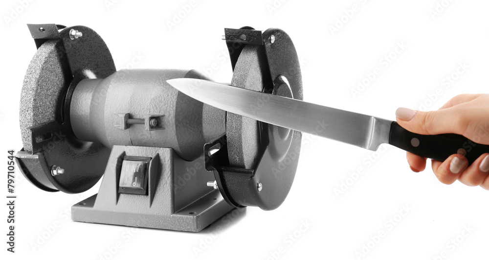 Sharpening knife process isolated on white