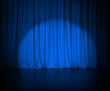 theatre dark blue curtain or drapes with light spot