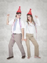 Poster - Composite image of happy geeky couple dancing