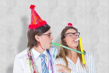 Poster - Geeky hipster wearing a party hat with blowing party horn