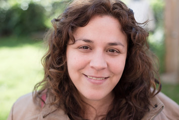 Portrait of a brunette woman smiling