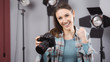 © StockPhotoPro - Photographer posing in a professional studio