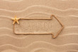 Arrow made of rope and sea shells with the word Acapulco on the
