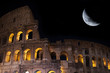 View of the coliseum with moon in background