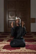 © Jale Ibrak - African Muslim Praying In Mosque