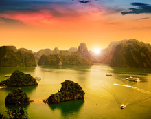 Halong Bay In Sunset, Vietnam. Unesco World Heritage Site.