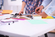 © lenetsnikolai - Young business people working at office on new project