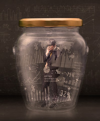 Poster - Businessman traped in jar with graph chart symbols concept