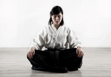 Beautiful, Young Woman Meditating In A Sports Hall 1