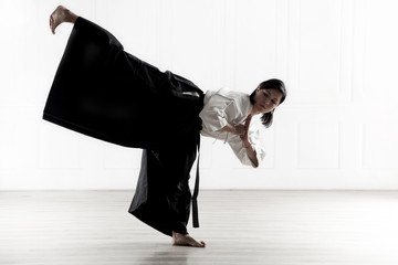 Sticker - beautiful woman wearing a hakama engaged in Jiu Jitsu 8