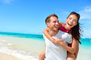 Wall Mural - Happy couple in love on beach summer vacations