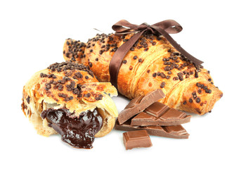 Wall Mural - Fresh and tasty croissants with chocolate, isolated on white