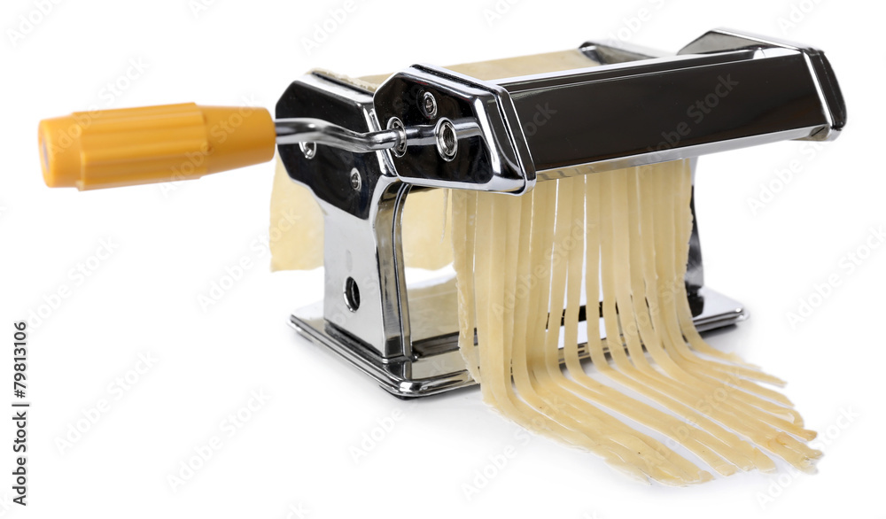 Metal pasta maker machine with dough isolated on white