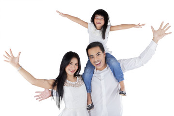 Poster - Cheerful family with arms up look happy