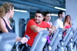 © .shock - Group of people running on treadmills
