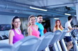 © .shock - Group of people running on treadmills