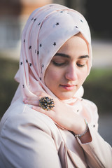 Poster - young beautiful muslim woman at the park