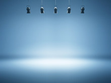 Blue Spotlight Background With Studio Lamps