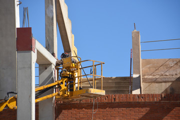 Canvas Print - trabajando sobre una grua