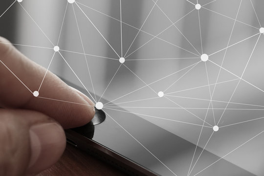 close up of businessman finger use tablet computer with virtual