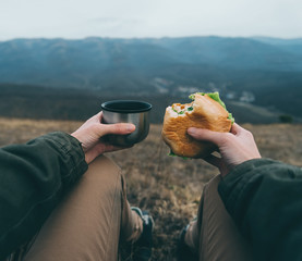 Poster - Woman have lunch on nature. Point of view shot