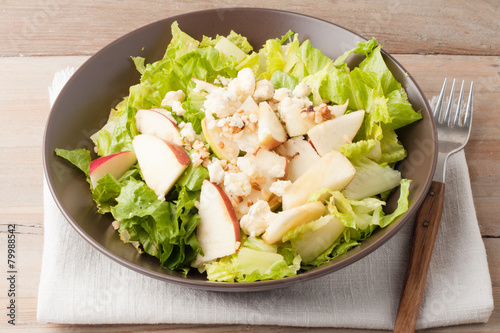 Fotografie, Obraz salad with apples and walnuts on rustic wooden background