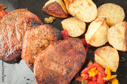 Succulent thick juicy portions of grilled fillet steak Poster