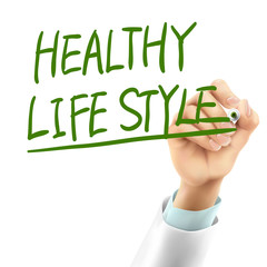 Wall Mural - doctor writing healthy life style words