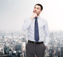 Canvas Print - handsome businessman looking up