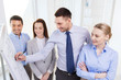 © Syda Productions - smiling business people meeting in office