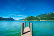 Pier on lake with mountains