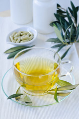 Wall Mural - Olive leaf herbal tea  and olive leaf extract capsules . Dietary