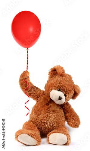 teddy holding balloons