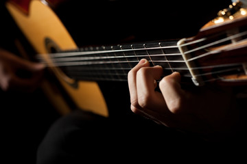 Man playing acoustic guitar