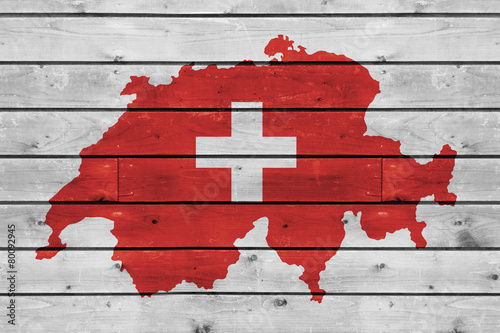 Fotomural switzerland map on wood texture background