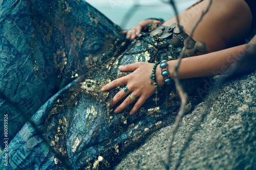 Plakat Tribal style girl on the stone rocks
