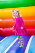 Little girl jumping and bouncing