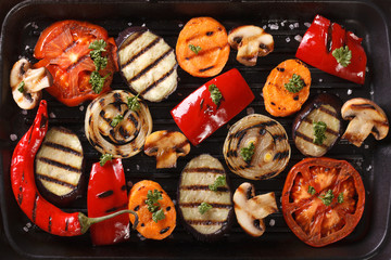 Wall Mural - Background of grilled vegetables close up. Horizontal top view