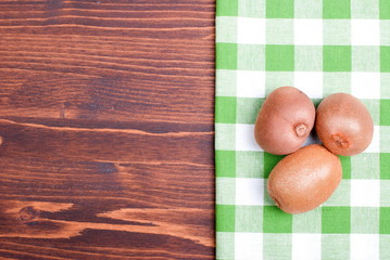 Sticker - delicious ripe kiwi on the board with a napkin