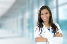 Confident Young Female Doctor Medical Professional In Hospital
