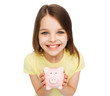 © Syda Productions - beautiful little girl with piggy bank