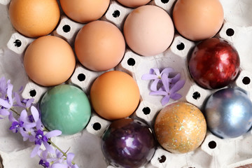  Colorful easter eggs on paper tray.